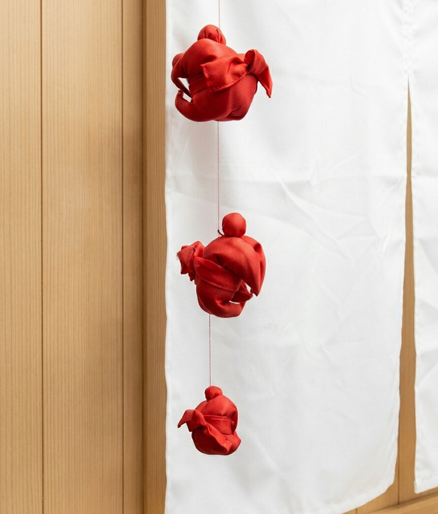 のれんの飾り　しばり猿